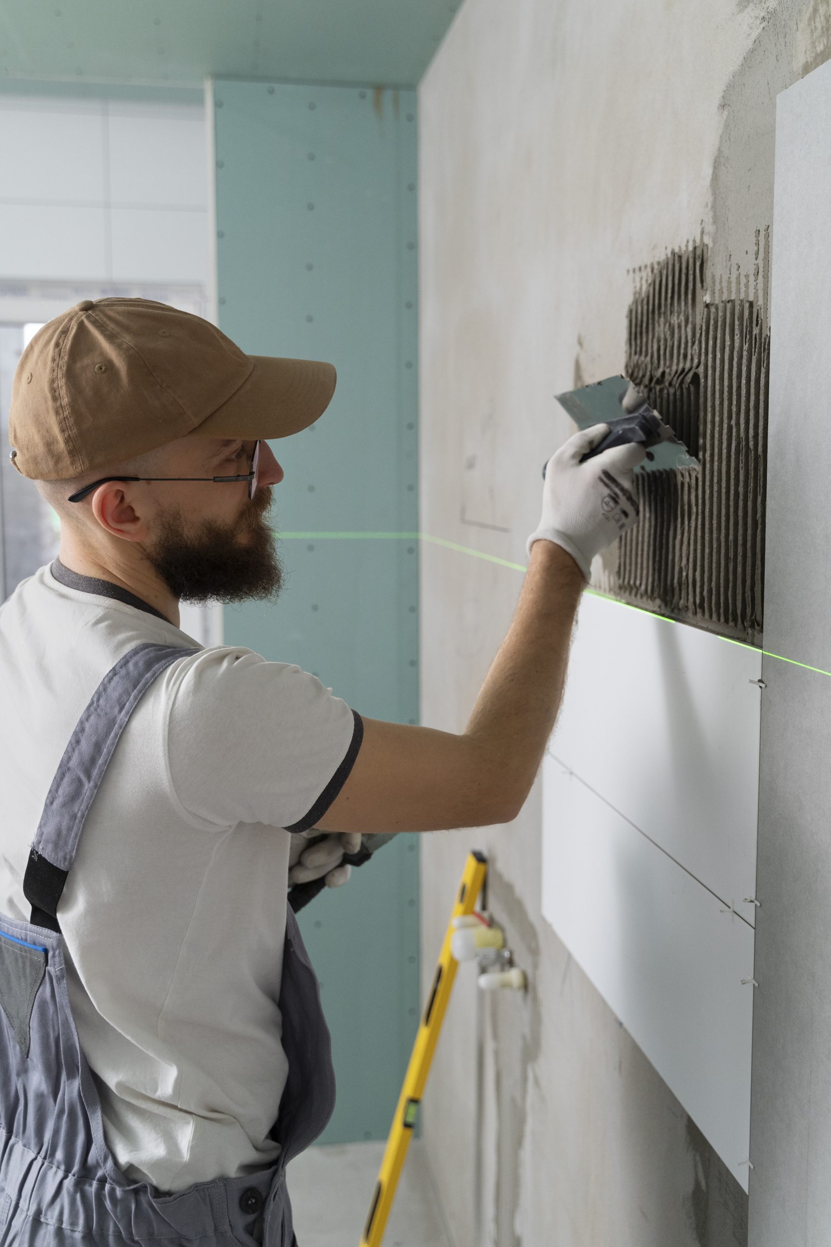 tiler working renovation apartment